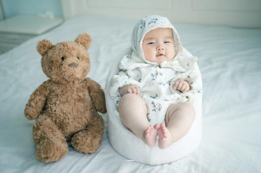 荆州宝宝吐奶是什么原因